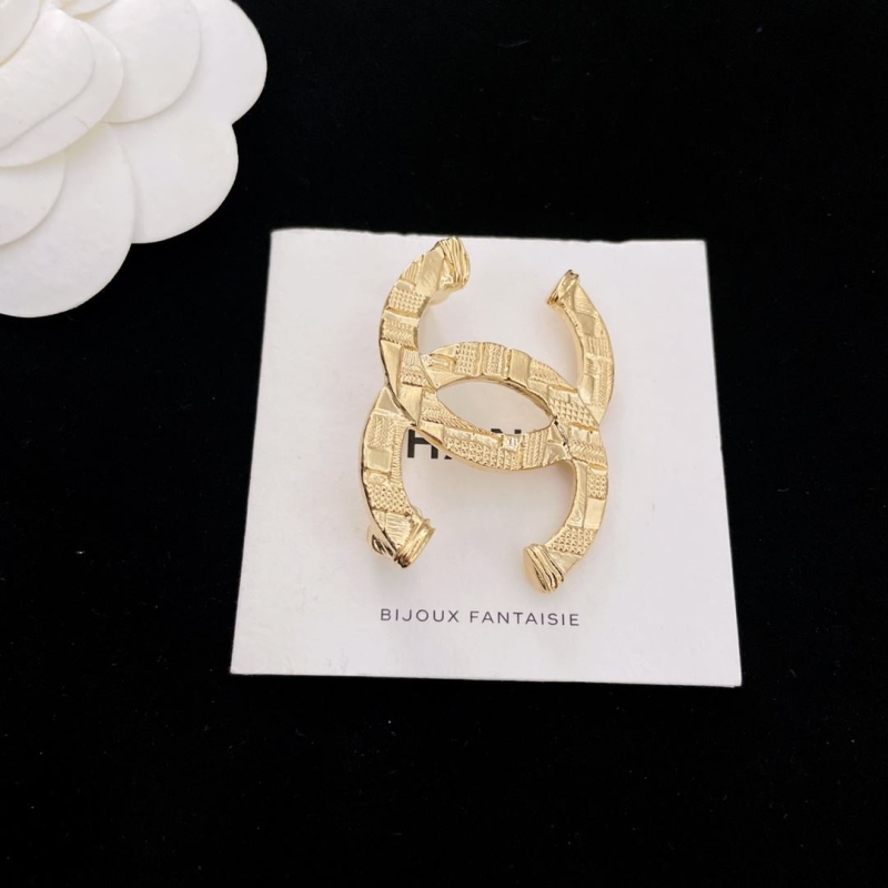 Ch**el brooches